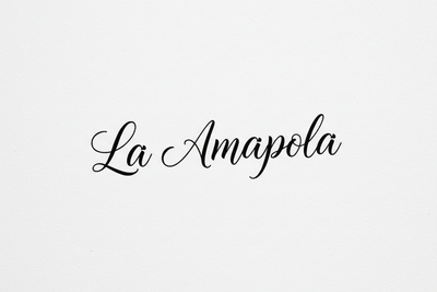 La Amapola write in coursive 