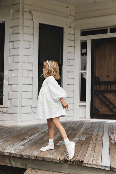 Jasmine White Cotton Dress with a Black Bow