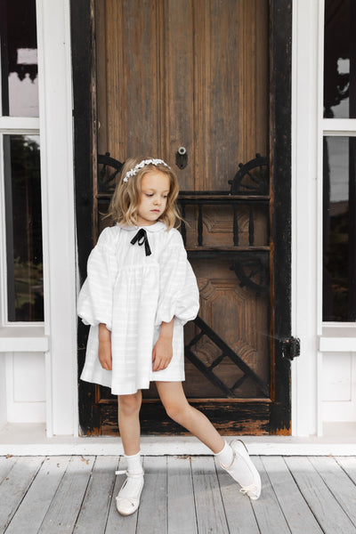 Jasmine White Cotton Dress with a Black Bow